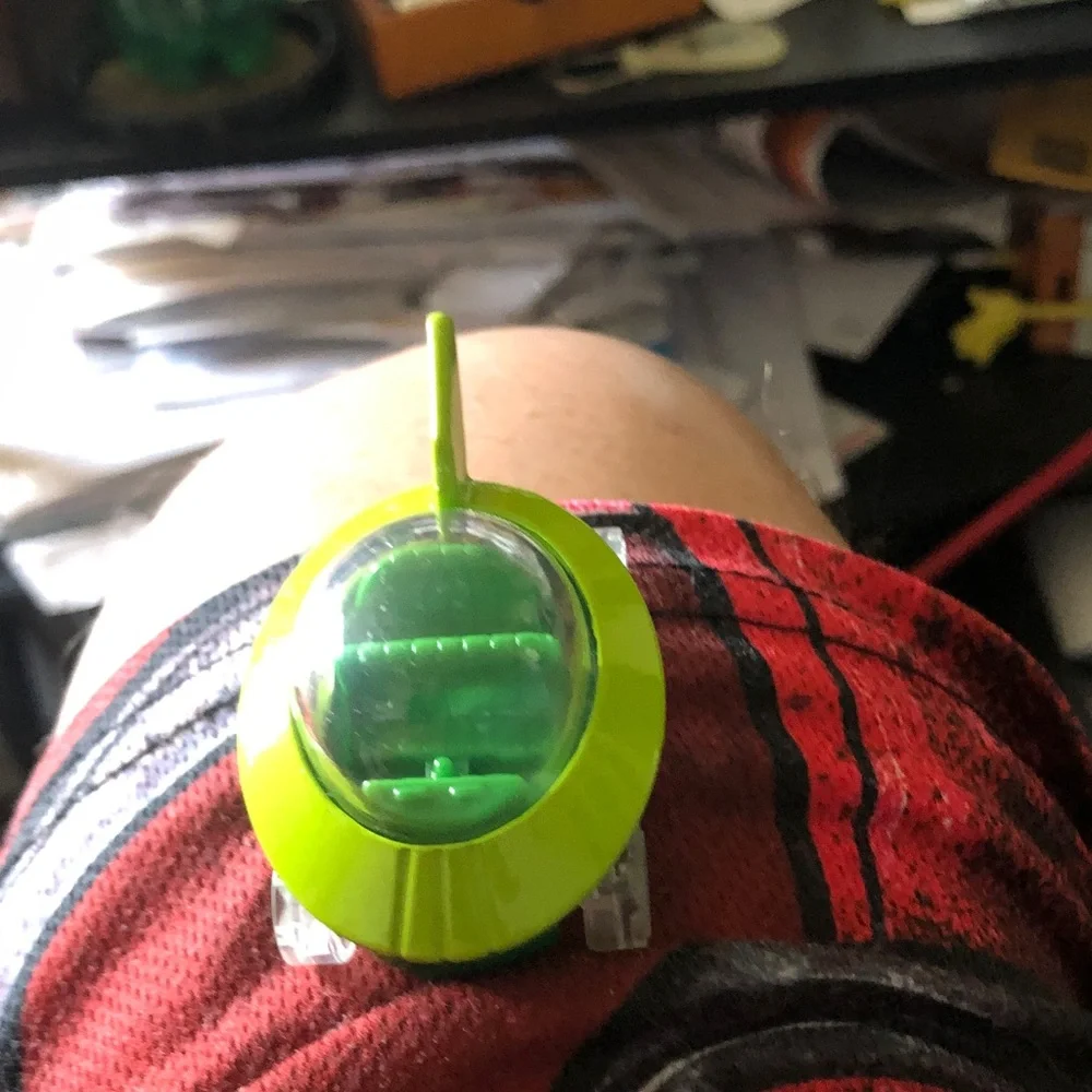 Green Electronic Wearable Tracker - Compact Clip-On